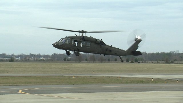 An engineering development model UH-60V Black Hawk hovers above the runway as part of its successful initial test flight Jan. 19, 2017 in Meridianville, Alabama. The UH-60V is being designed to update existing UH-60L analog architecture with a digital infrastructure to address evolving interoperability and survivability requirements. (Photo courtesy Shannon L Kirkpatrick, PEO Aviation)
