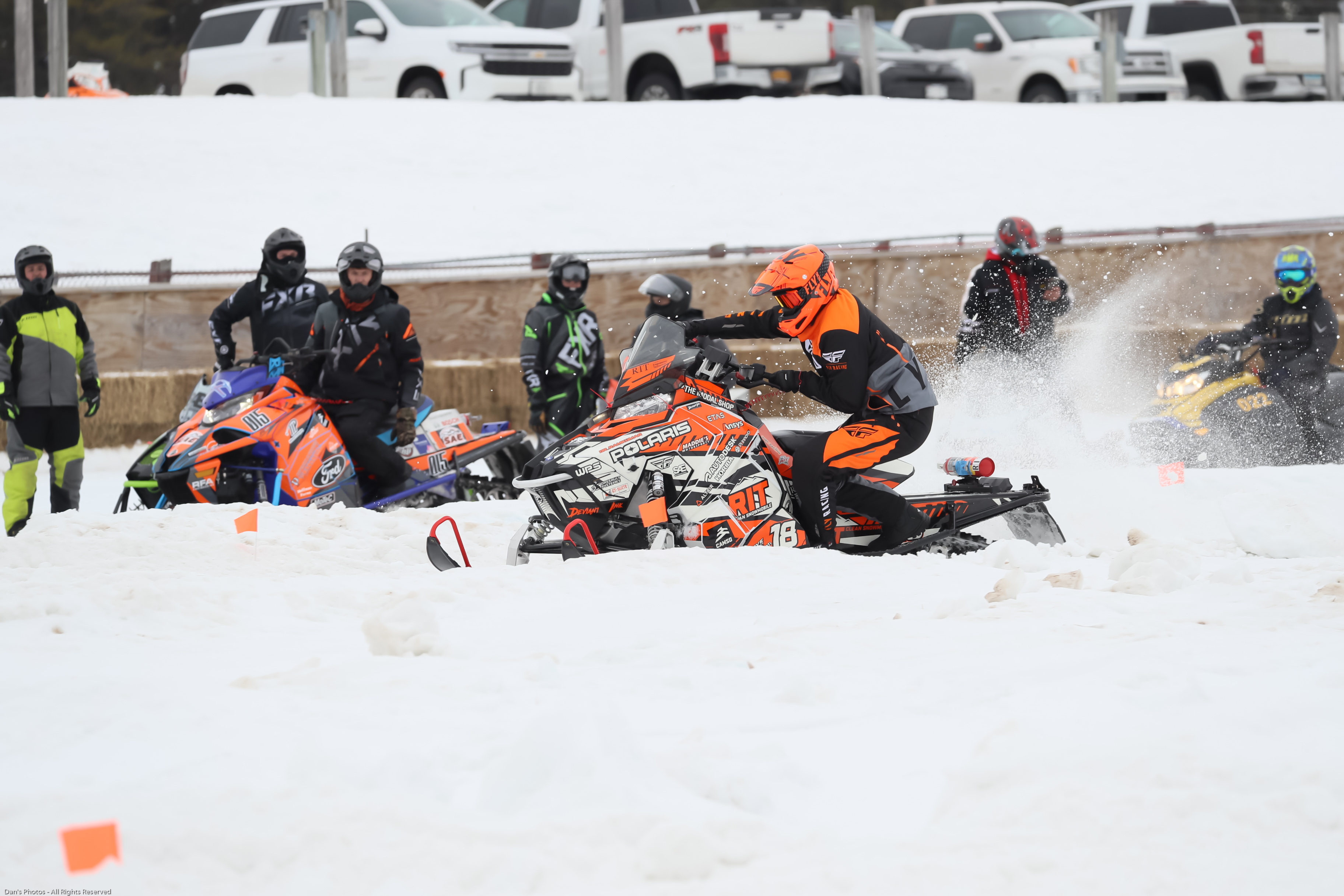 Snowmobile racing in competition
